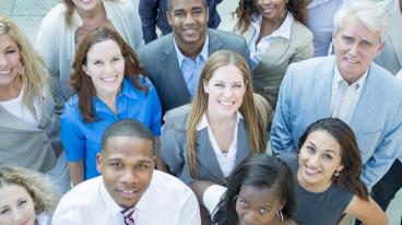 Our Faculties image - group of business people looking up to the sky